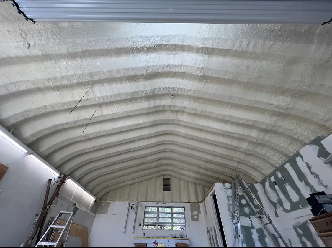 Spray polyurethane foam applied to the underside of a metal roof deck in Pontoon Beach